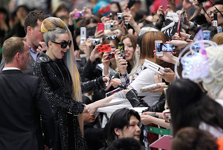 Picture desk live: Singer Lady Gaga meets fans upon her arrival at Narita, Japan
