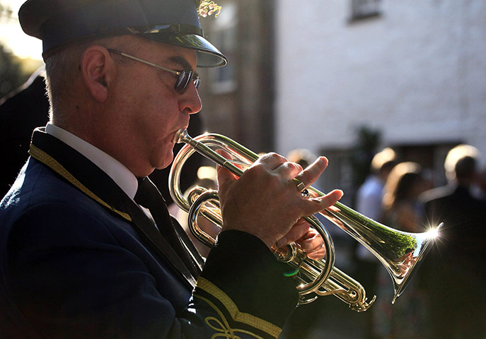 Helston Flora Day: The Helston Town Band leads dancers