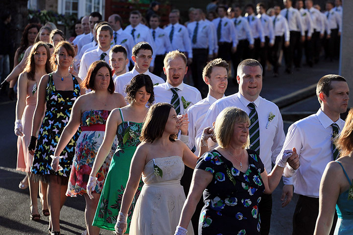 Helston Flora Day: Dancers follow the Helston town band