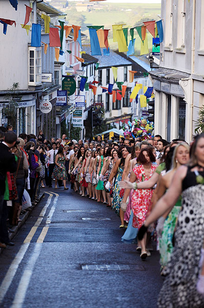 Helston Flora Day: Dancers follow the Helston town band