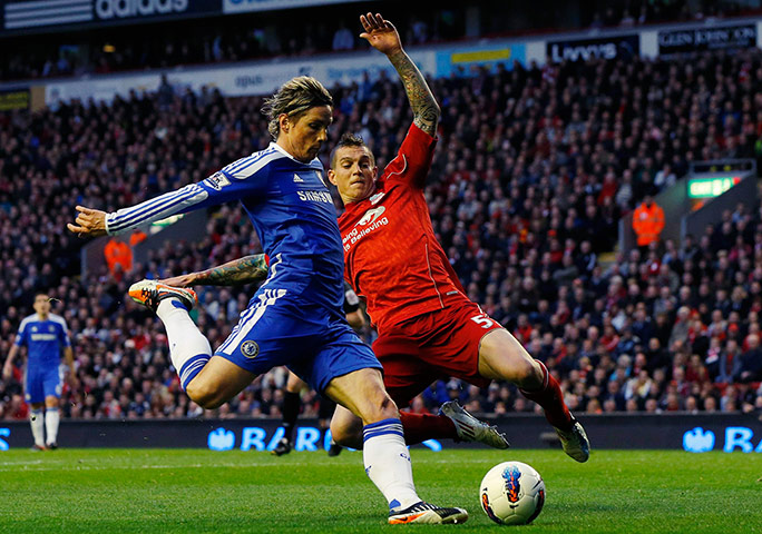 Liverpool v Chelsea: Liverpool's Daniel Agger challenges Chelsea's Fernando Torres