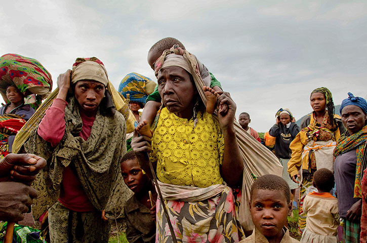 Picture desk live: Congolese refugees flee violent clashes between the army and rebels