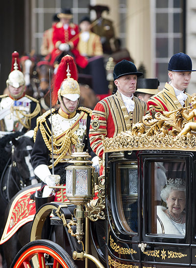 Picture desk live: The Queen makes her way to Westminster for the State Opening of Parliament