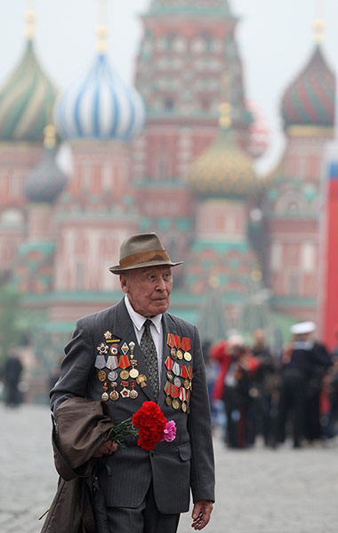 Victory Day in Russia: A Russian WWII veteran walks in Red square
