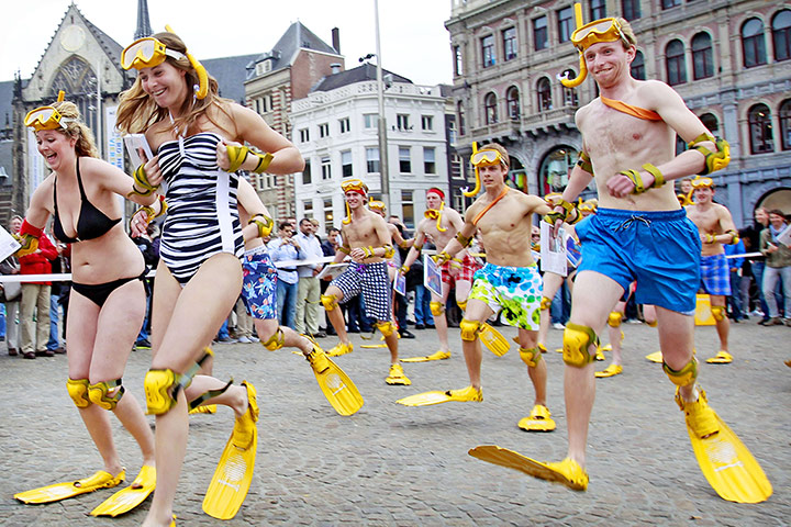 Picture desk live: People participate in the National Flipper Race in Amsterdam