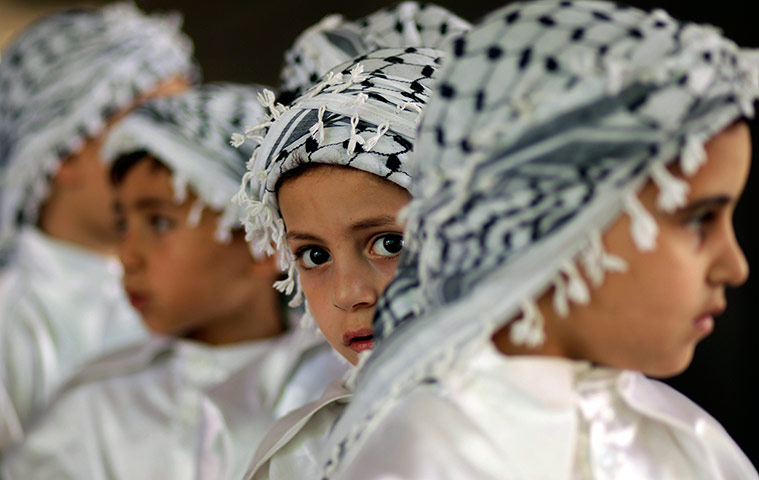 Picture desk live: Palestinian children take part in a rally in Gaza City ahead of Nakba