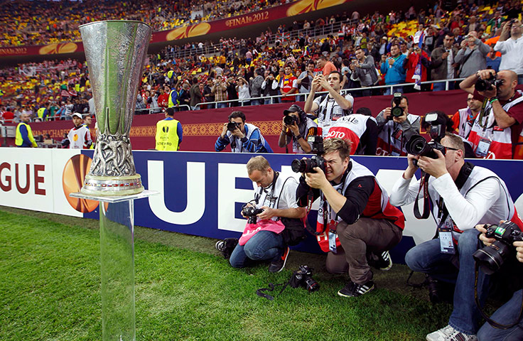 Europa League Final: Photographers take pictures of the Europa League Trophy