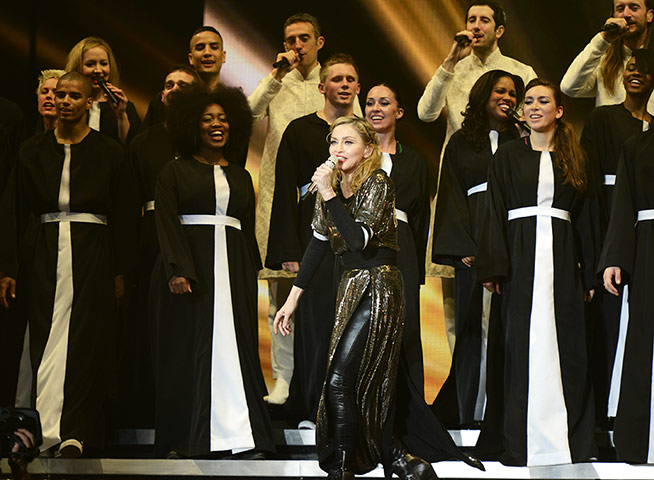 Madonna: Madonna on stage with her backing singers