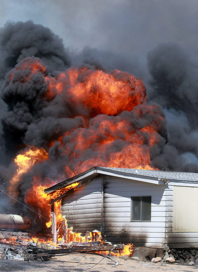 Wildfires in the US: A home is engulfed by flames from a wildfire, south of Gardnerville, Nevada