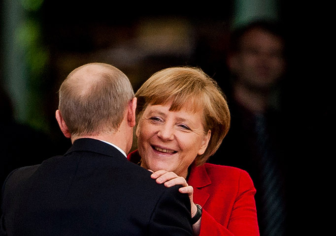Picture desk live: Putin Meets With Merkel In Berlin