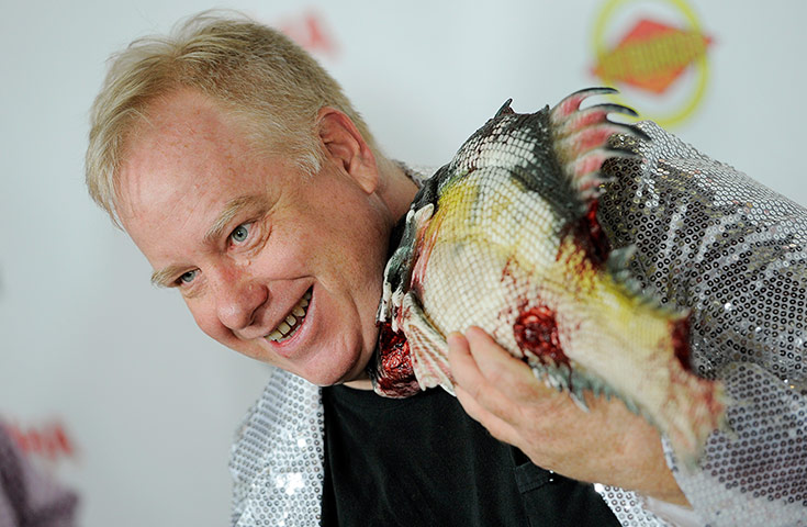 week in film: John Gulager poses with a piranha prop 