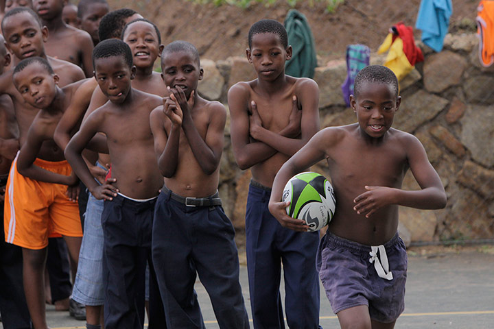 Picture desk live: A young rugby player during a team exercise in Zandspruit, South Afric
