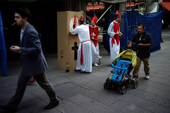 24 hours: Madrid, Spain: Spaniards dressed up like bishops for a stag party 