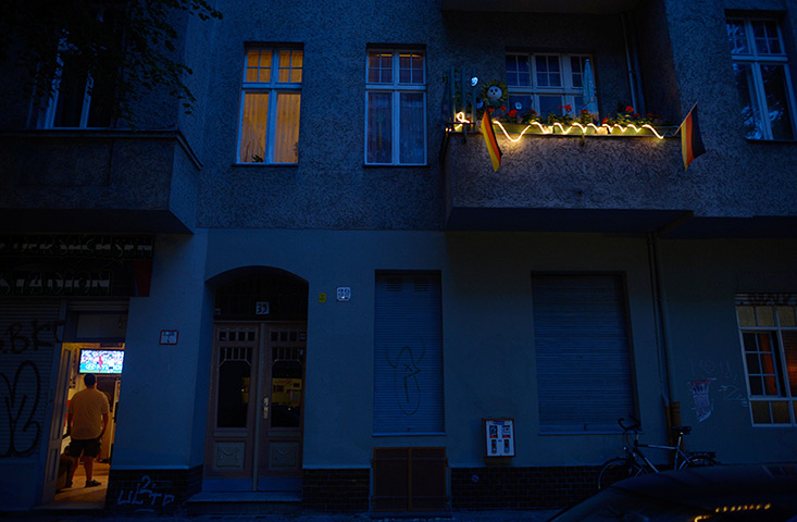 24 hours: Berlin, Germany: A Germany supporter watches his team's opening match