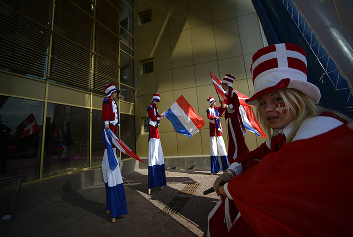 24 hours: Kharkiv, Ukraine: Stilt performers at the Metalist Stadium 