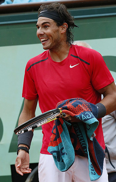 tennis2: Spain's Rafael Nadal reacts after a poin