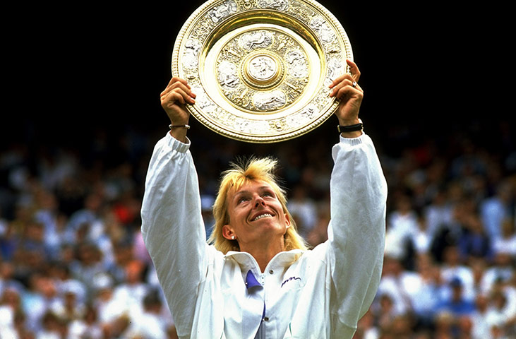 Tennis: Martina Navratilova of the USA holds up the winners'' plate