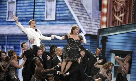  Host Neil Patrick Harris (L) performs during the American Theatre Wing's 66th annual Tony Awards