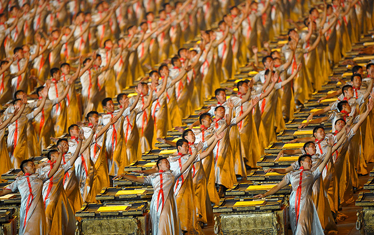 Olympic games opening: Beijing 2008: Actors perform at the opening ceremony at the Bird's Nest