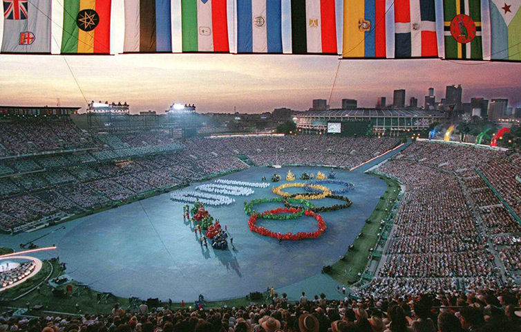 Olympic games opening: Atlanta 1996: The Olympic Stadium as performers form the Olympic rings