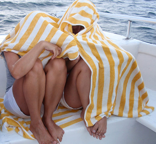 Your Pictures: Your Pictures: Two young women sheltering from a shower on a cruise