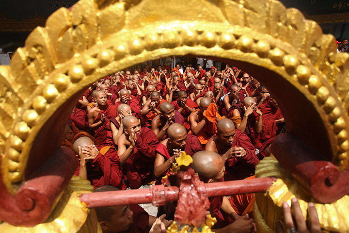 24 hours in pictures: Burma ethnic Rakhine monks gather and pray 
