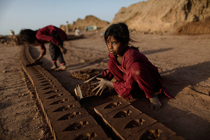 Picture desk live: Thaminah Sadiq at work in a brick factory on the outskirts of Islamabad