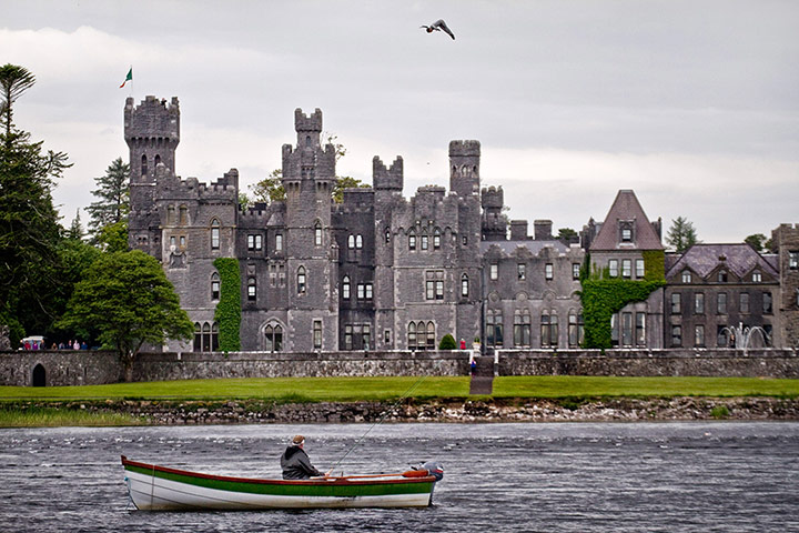 Picture desk live: Orlando Duque dives 23 metres from a helicopter at Ashford Castle