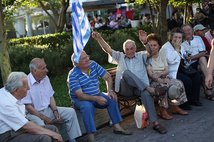 Greece: 13-14 June: Supporters of Evangelos Venizelos wait to hear him speak at a rally, Athens