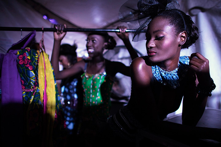 24 hours in pictures: Models wait backstage during Dakar Fashion Week