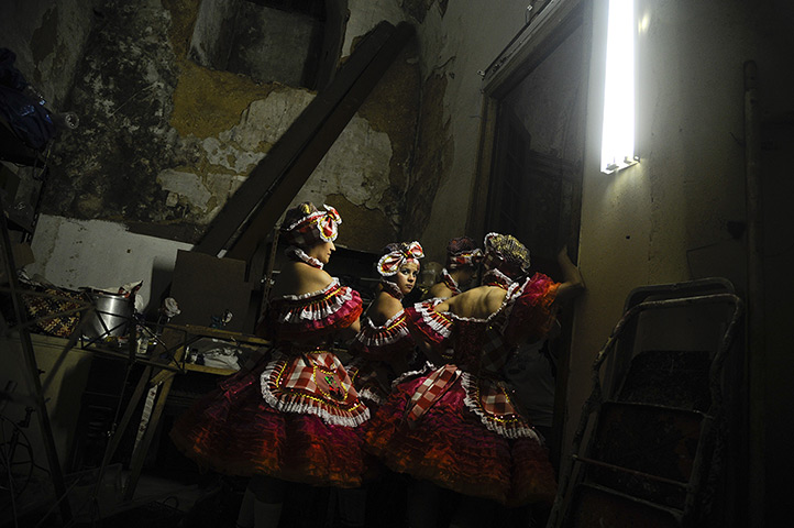 24 hours in pictures: Reveller at Saint Anthony's Parade on Avenida da Liberdade