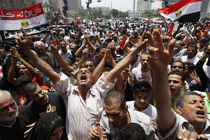 Picture desk live update: Protesters shout slogans in Cairo