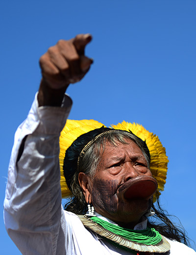 24 hours in pictures: Brazilian's indian Raoni chief speaks with journalists