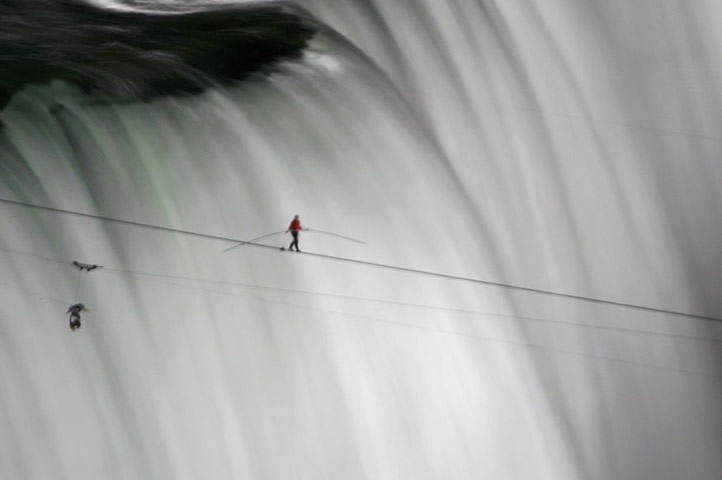 niagara falls tightrope: Nik Wallenda is a miniature figure against Niagara Falls