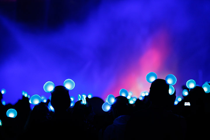 24 Hours: People wear illuminated mouse ears at the World of Color show in California