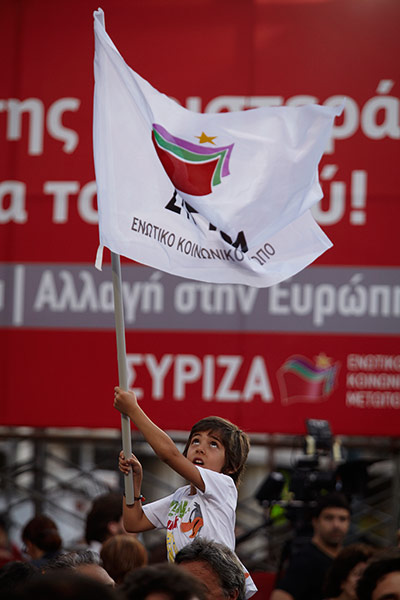 Andy Hall Athens: A young supporter attends the Syriza party rally