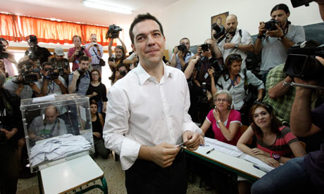 Alexis Tsipras is seen in a polling station after voting in Athens 17 June