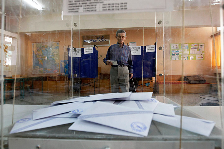Greek elections: A man walks to cast his ballot in a polling station in Athens