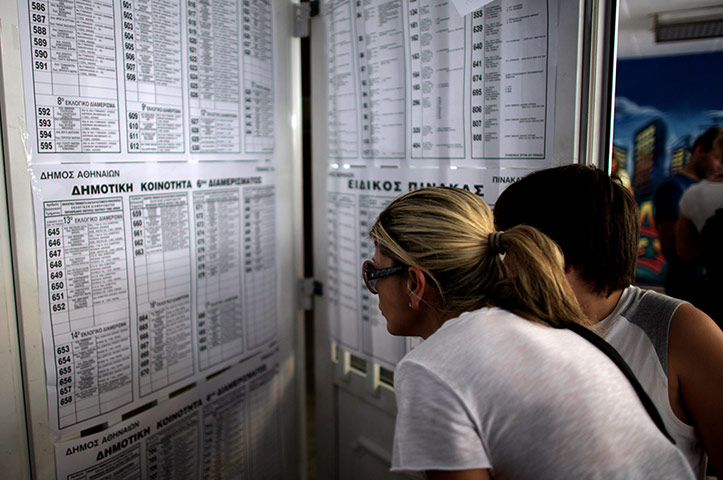 Greeks vote: Greek voters check details of which polling station to attend