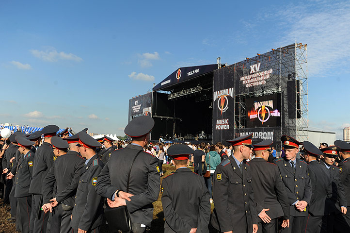 Week in music: Police officers at Maxidrom rock festival, in Moscow on 10 June