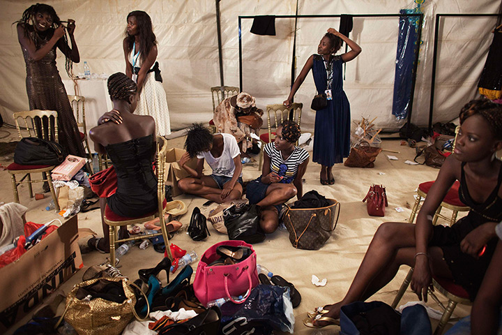 24 hours in pictures: Models change outfits backstage during the 10th annual Dakar Fashion Week