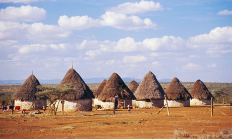 Clouds Over Laikipia Masai Rondavels