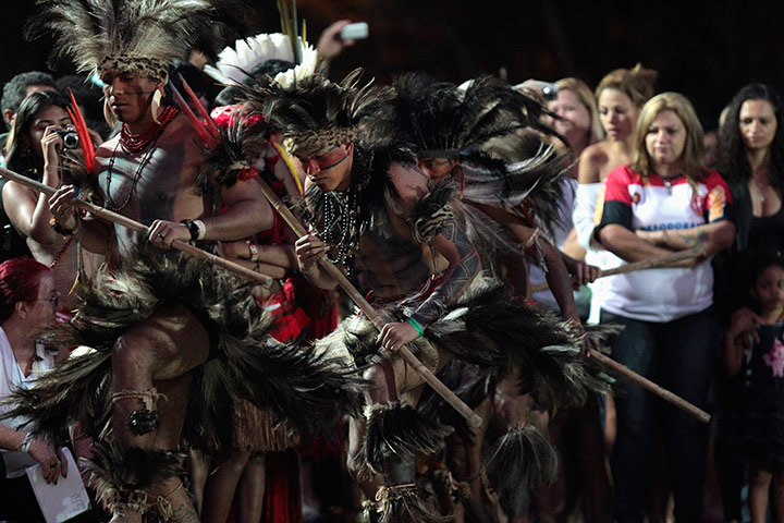 UN Rio+20: Indigenous men from Terena tribe dance at Kari-Oca village