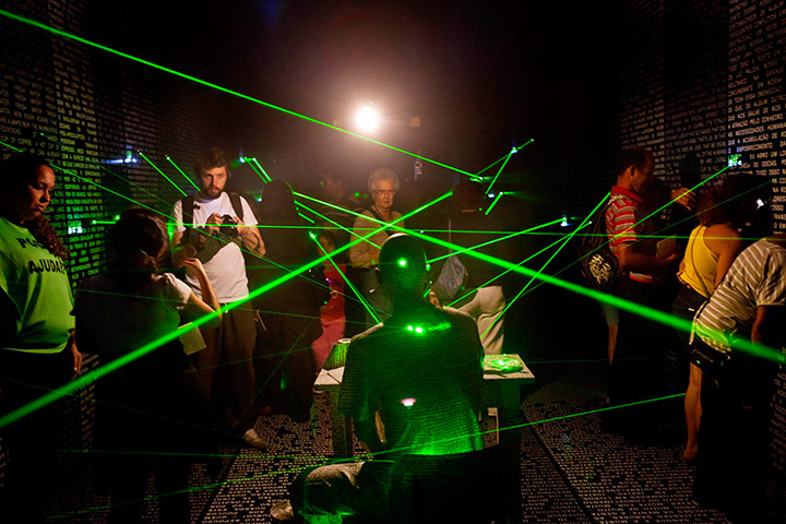 UN Rio+20: People watch an exhibition at the Copacabana Fort in Rio de Janeiro