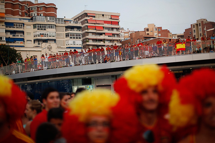 24 hours in pictures: Spain supporters watch the Euro 2012 match