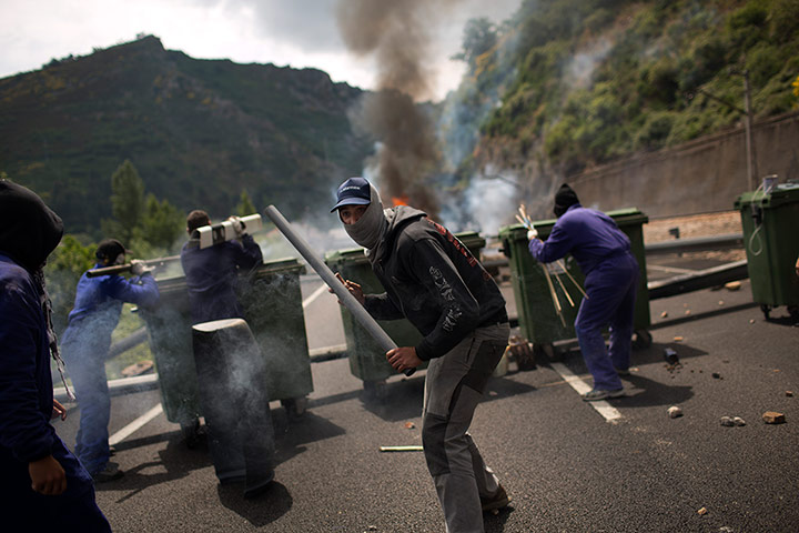 Picture desk live: Miners fire handmade rockets