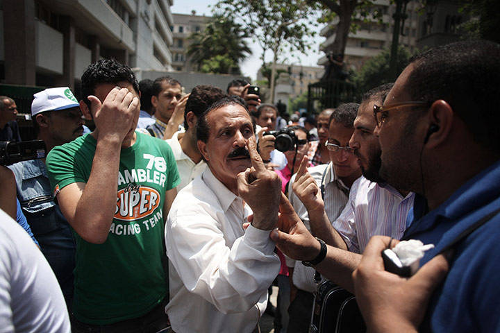 Picture desk live: Egyptians argue during a protest