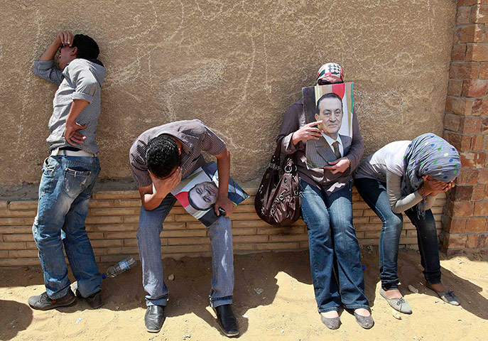 Mubarak Sentencing: Supporters of Hosni Mubarak react after the court verdict