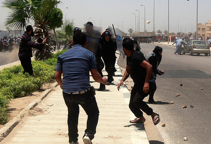 Mubarak Verdict Updated: Riot police and protesters clash after the Mubarak verdict