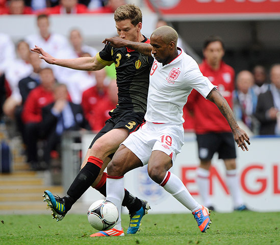 ENGLAND V BELGIUM: Jermain Defoe tussles with Jan Vertonghen